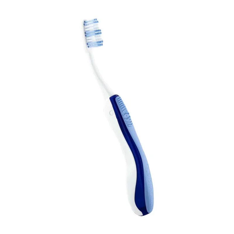 Gros plan sur la brosse à dents ELGYDIUM POCK Souple dépliée, corps blanc, manche bleu-turquoise, po